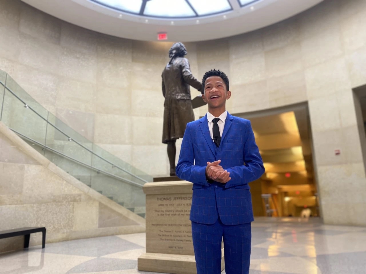 Advocate Elijah Lee standing at the state capitol